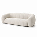 Canapé 4 places en tissu bouclé écru avec assise capitonnée, 240 x 100 x 75 cm